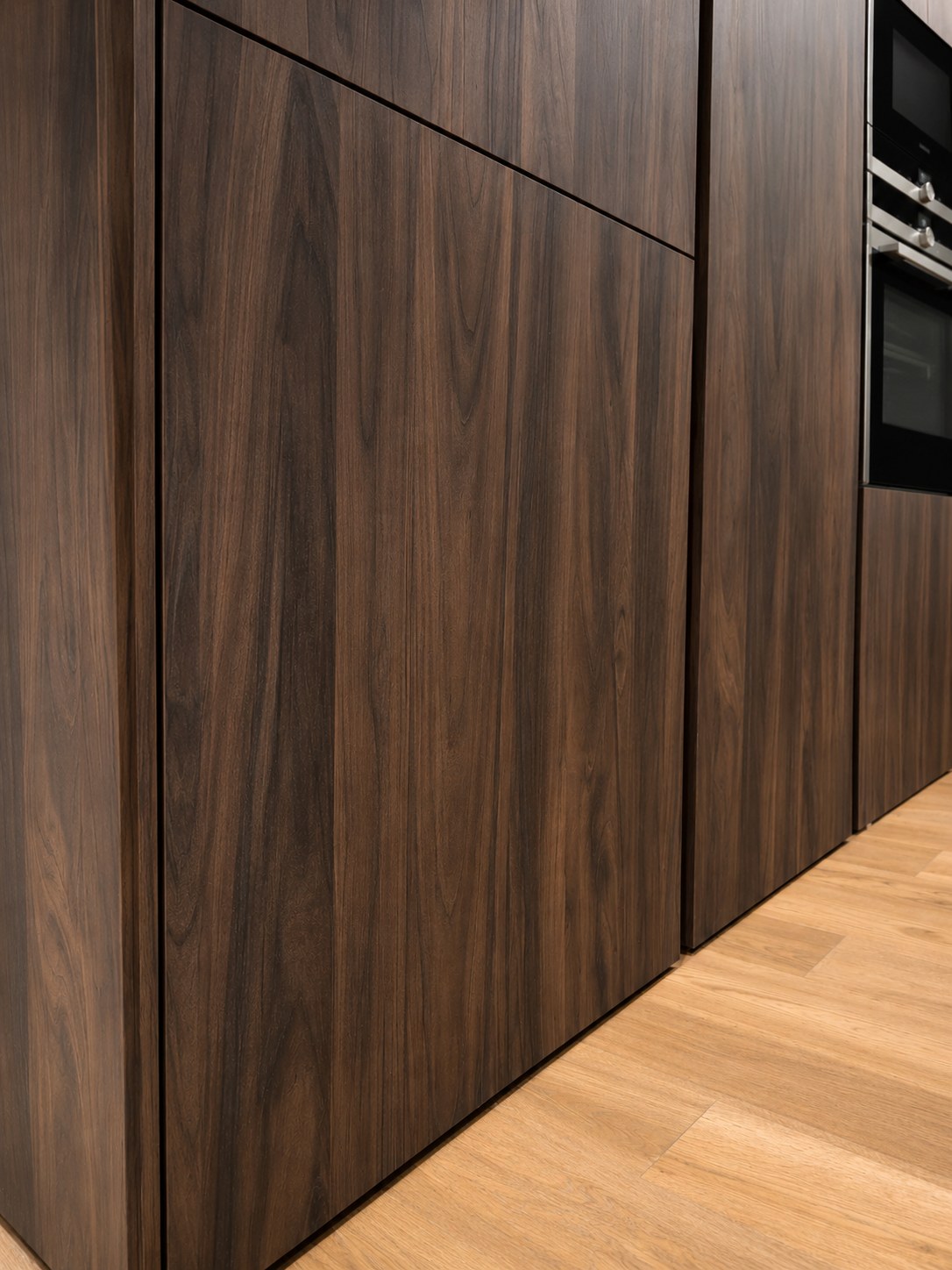MobilCasa — Modern Gentili Time Kitchen — Gerakas · walnut and built-in oven