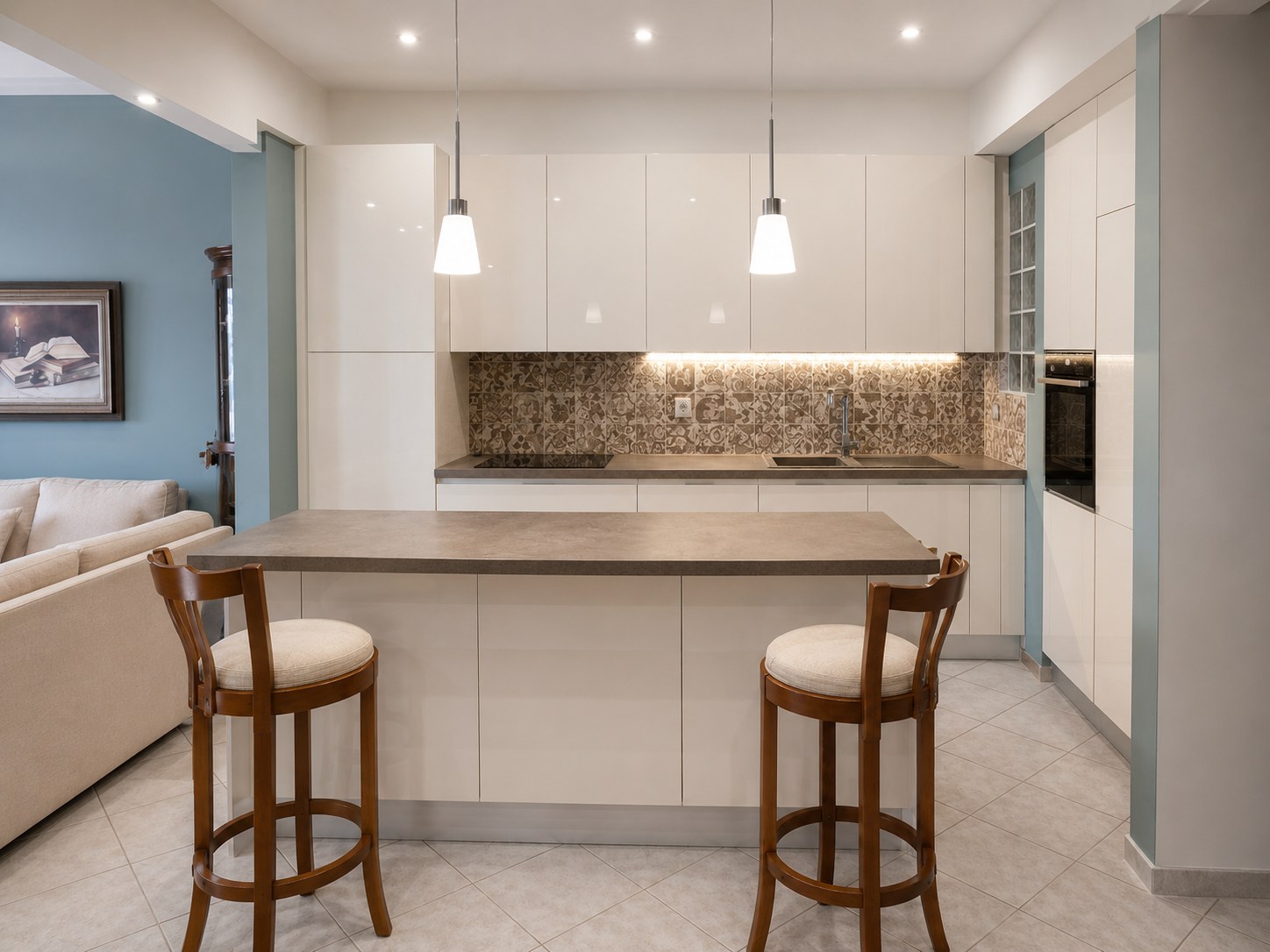 Breakfast-bar island with stools, Febal Origina Avorio kitchen — view from the living area