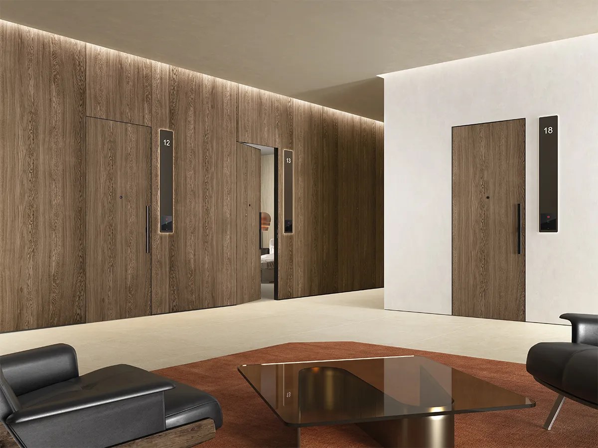 Barausse Sliding doors integrated into wall paneling — detail