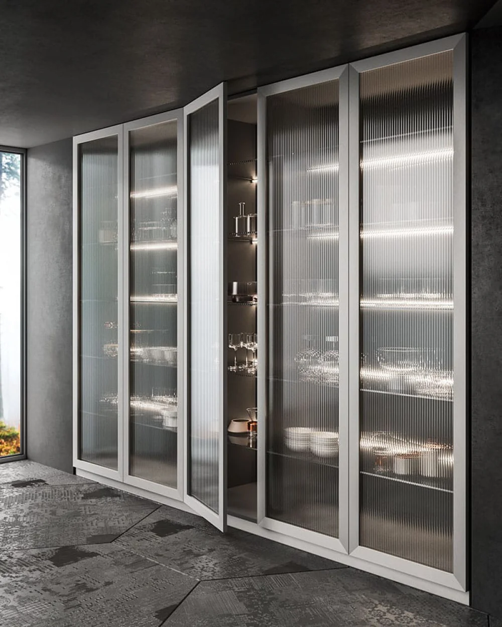 LED lighting in glazed display cabinets, picking out the shelf contents