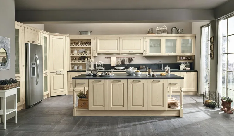 Febal Opera 05 island in ivory lacquer with rows of drawers and dark worktop, in a classic composition with built-in fridge