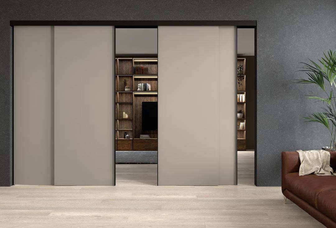 GF Interiors E.S.P. FUSION — E.S.P. Fusion system — sliding doors built into a bookcase/boiserie.