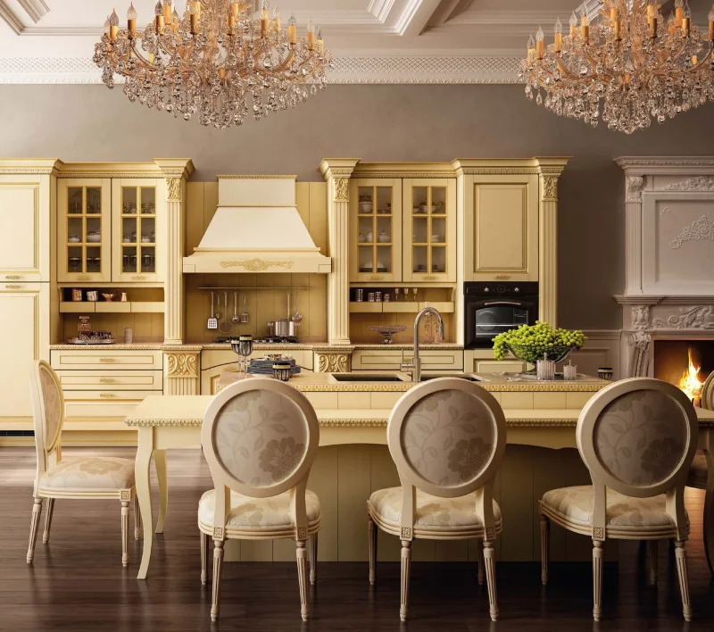 Sira Vittoria island in ivory and gold, beneath crystal chandeliers
